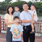 [Missionary couple Yao Kuang & Yi Ching Liu with their sons]